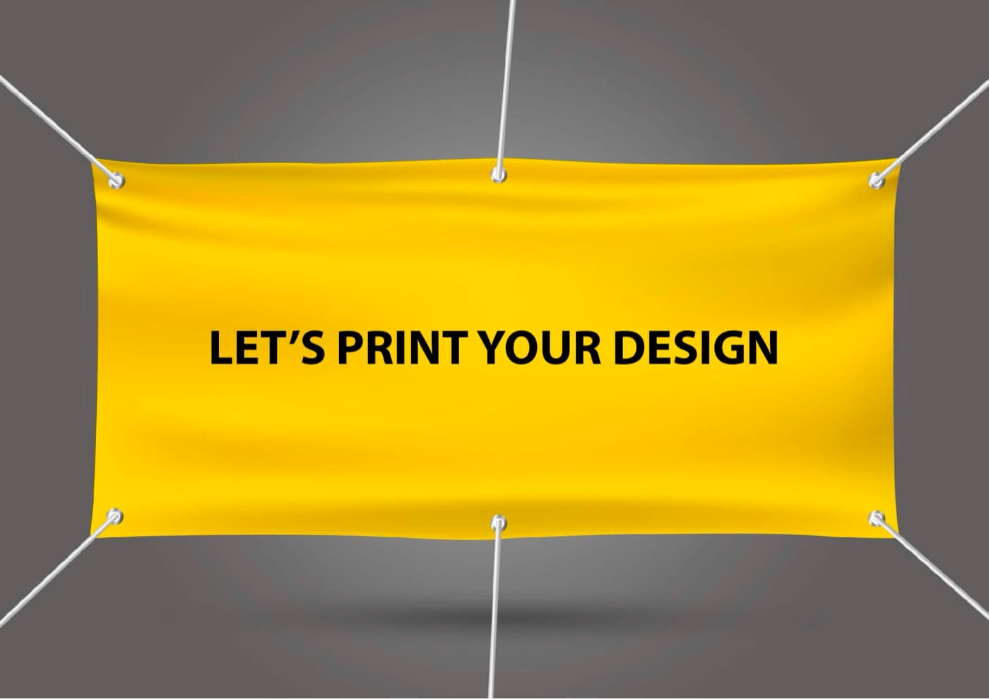 Yellow tarpaulin banner reading “Let’s print your design”